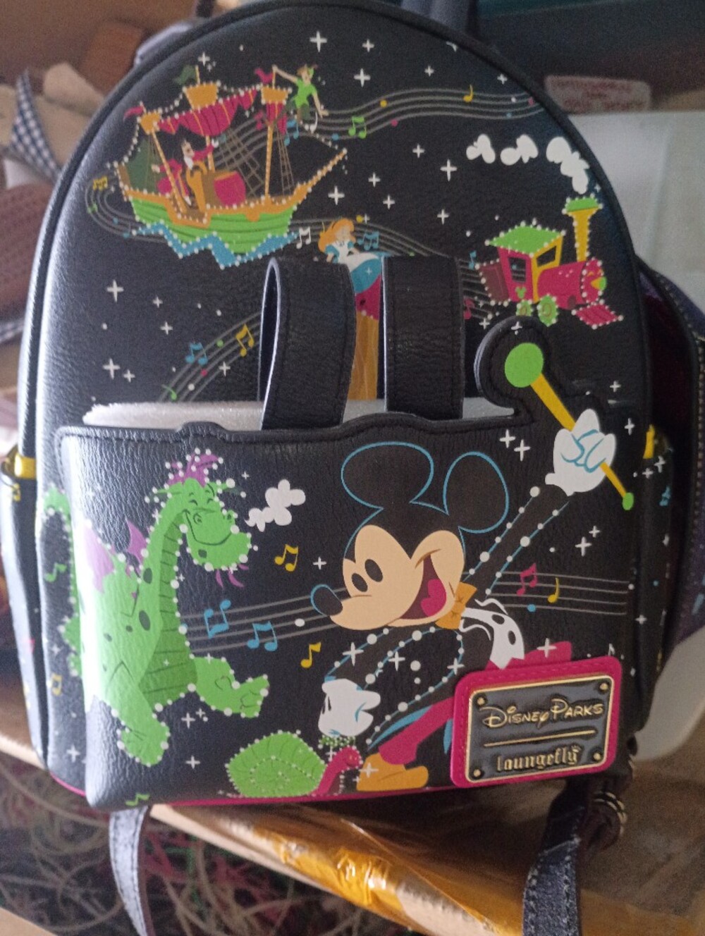 Disney Black Mini Backpack with Pink Trim and Colorful Fantasy Print